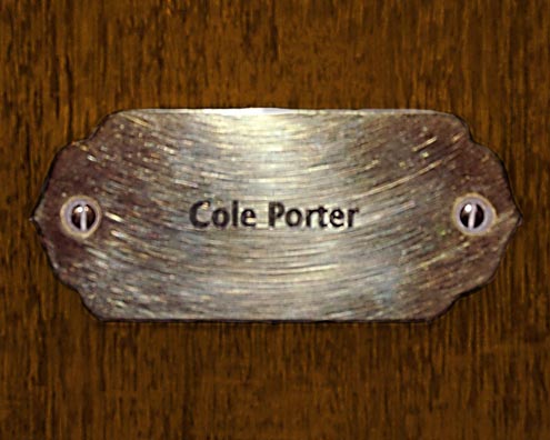 “MAMAS DON'T LET YOUR BABIES GROW UP TO BE COWBOYS”<br/>
Cole Porter<br/>
2009 ongoing <br/>
C-Print of a Name Plate Reserving a Hotel Room in Perpetuity for the Song Writing Jazz Legend, Cole Porter<br/>
Mounted on Wood with Non-Glare Plexiglas Surface<br/>
7 3/4” x 9 3/4” x 3/4” <br/>
