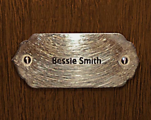 “MAMAS DON'T LET YOUR BABIES GROW UP TO BE COWBOYS”<br/>
Bessie Smith<br/>
2009 ongoing <br/>
C-Print of a Name Plate Reserving a Hotel Room in Perpetuity for the Songstress Jazz Legend, Bessie Smith<br/>
Mounted on Wood with Non-Glare Plexiglas Surface<br/>
7 3/4” x 9 3/4” x 3/4” <br/>