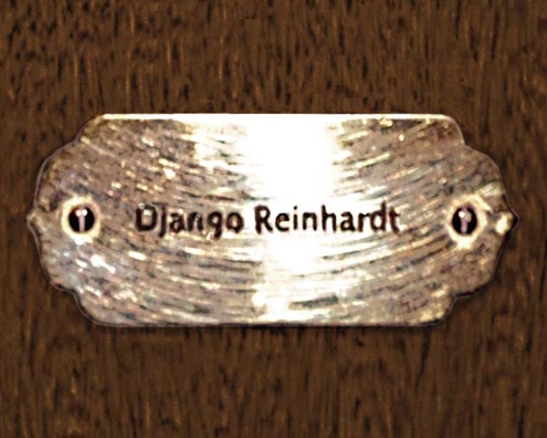 “MAMAS DON'T LET YOUR BABIES GROW UP TO BE COWBOYS”<br/>
Django Reinhardt <br/>
2009 ongoing <br/>
C-Print of a Name Plate Reserving a Hotel Room in Perpetuity for the Guitar Jazz Legend, Django Reinhardt<br/>
Mounted on Wood with Non-Glare Plexiglas Surface<br/>
7 3/4” x 9 3/4” x 3/4” <br/>