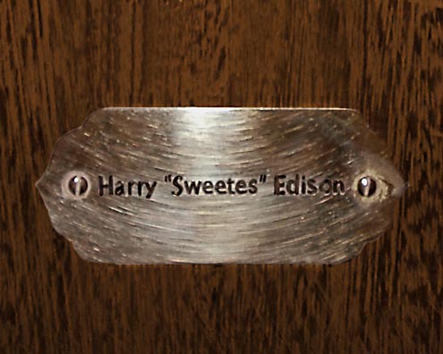 “MAMAS DON'T LET YOUR BABIES GROW UP TO BE COWBOYS”<br/>
Harry “Sweetes” Edison [Sic]<br/>
2009 ongoing <br/>
C-Print of a Name Plate Reserving a Hotel Room in Perpetuity for the Trumpet Jazz Legend, Harry Sweets Edison<br/>
Mounted on Wood with Non-Glare Plexiglas Surface<br/>
7 3/4” x 9 3/4” x 3/4” <br/>