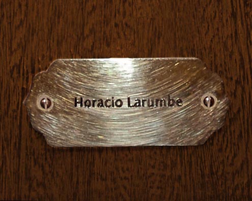 “MAMAS DON'T LET YOUR BABIES GROW UP TO BE COWBOYS”<br/>
Horatio Larumbe<br/>
2009 ongoing <br/>
C-Print of a Name Plate Reserving a Hotel Room in Perpetuity for the Piano Jazz Legend, Horatio Larumbe<br/>
Mounted on Wood with Non-Glare Plexiglas Surface<br/>
7 3/4” x 9 3/4” x 3/4” <br/>