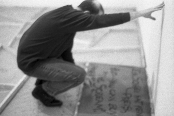 NORMA TALMADGE'S CHINESE THEATER: THE EUROPEAN LEG; KOLN<br />
1992 Ongoing<br />
Happening: Viewer's Immortalizing Themselves by Making Imprints in Fresh Cement in Homage to the Forgotten Silent Diva, Norma Talmadge, the Accidental Auteur of the Canonical Practice<br />
Photograph of Happening Displayed in Collector's Edition Photograph Book: Michael Corris, “Professor X” (Self Titled)<br />
4” x 6”<br />