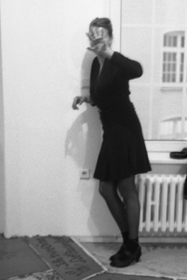 NORMA TALMADGE'S CHINESE THEATER: THE EUROPEAN LEG; KOLN<br />
1992 Ongoing<br />
Happening: Viewer's Immortalizing Themselves by Making Imprints in Fresh Cement in Homage to the Forgotten Silent Diva, Norma Talmadge, the Accidental Auteur of the Canonical Practice<br />
Photograph of Happening Displayed in Collector's Edition Photograph Book: Ursula Bockler, “Du Barry, Woman of Passion” (1930)<br />
4” x 6”<br />