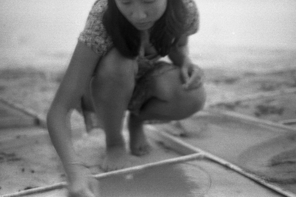 NORMA TALMADGE'S CHINESE THEATER: LA<br />
1992 Ongoing<br />
Happening: Viewers Immortalizing Themselves by Making Imprints in Fresh Cement in Homage to Forgotten Silent Diva, Norma Talmadge, the Accidental Auteur of the Canonical Practice<br />
Photograph of Happening Displayed in Collector's Edition Photograph Book: “A Daughter of Two Worlds” (1920)<br />
4” x 6”<br />