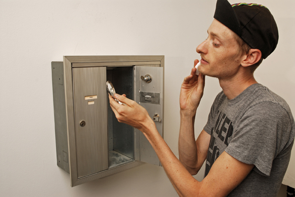 THE MAIL: HOLLY GOLIGHTLY<br />
1991 Ongoing <br />
Detail: 1, 3 Station Functioning Apartment Mailbox, with Matt Scobey Checking His Make Up with the Compact in Holly Golightly’s Mailbox<br />
Variable Dimensions<br />
Unique Edition: 1 AP <br />
