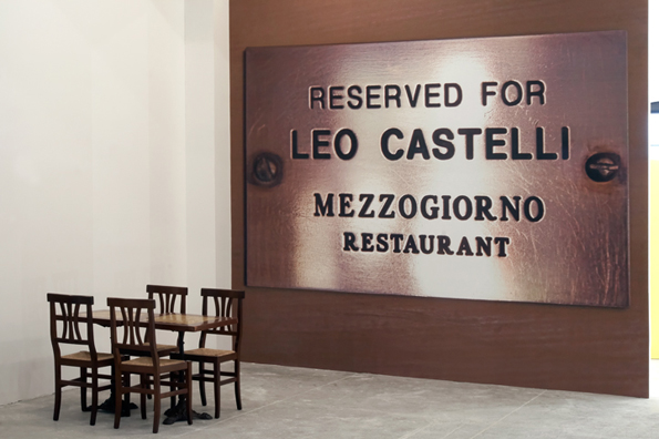 RESERVED FOR LEO CASTELLI: <i>SINCE CEZANNE</i> (After Clive Bell)<br />
2010 <br/>
Lateral View <br />
Wall: C-Print Wall Mural of Name Plate Reserving a Table in Perpetuity for the Preeminent Art Dealer Leo Castelli<br />
Floor: 2 Tables and 4 Chairs from the Restaurant Mezzogiorno<br />
Variable Dimensions<br />