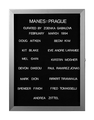 “WHAT'S LOVE GOT TO DO WITH IT?”<br />
Manes Prague<br />
1991: Ongoing<br />
Lobby Directory Board Listing Artists, Gallery, Curators, Exhibition Titles, Dates Replicating the Lobby Directory Board at 420 West Broadway<br />
(Series Initialized for the 1st Group Show in which the Artist Exhibited, and Made for Every Group Show Thereafter)<br />
18” x 24”<br />