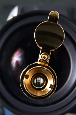 “IT’S DÉJÀ VU ALL OVER AGAIN” – YOGI BERRA <br/>
Peep<br/>
1991 Ongoing<br/>
Detail: Peephole View Outside Bathrom
Functioning Backward Peepholes Installed for Viewing Private Male/Female Bathrooms from Outside the Bathrooms<br/>
2” in Diameter<br/>
Unique, 1 AP<br/>